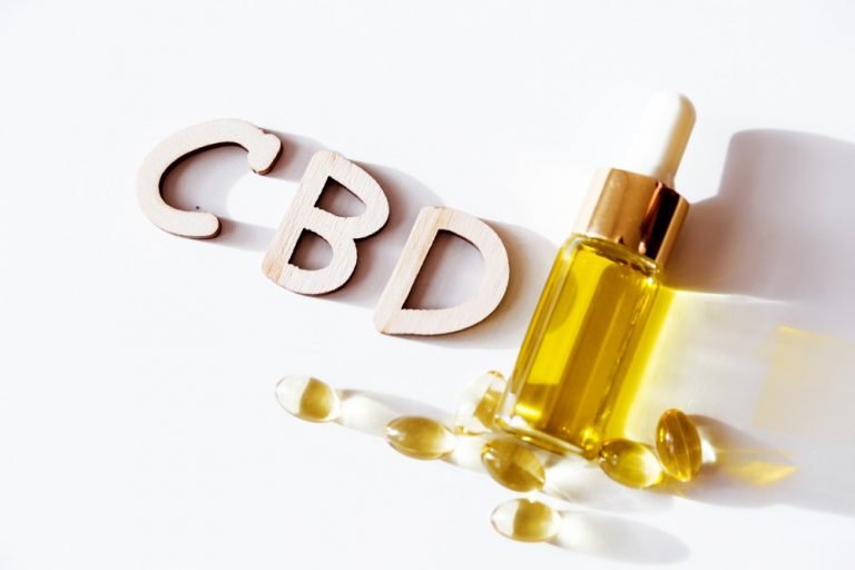 CBD with product and softgels