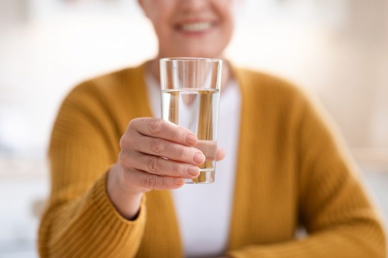 woman holding water