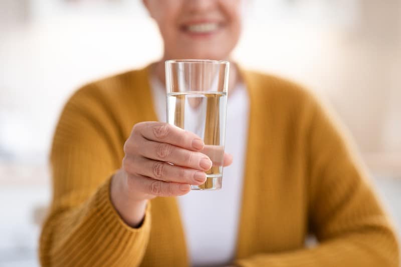 woman holding water
