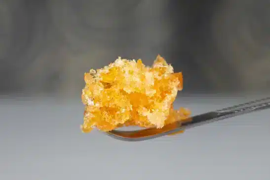 THCA crumble THCA crumble scooped by a spoon