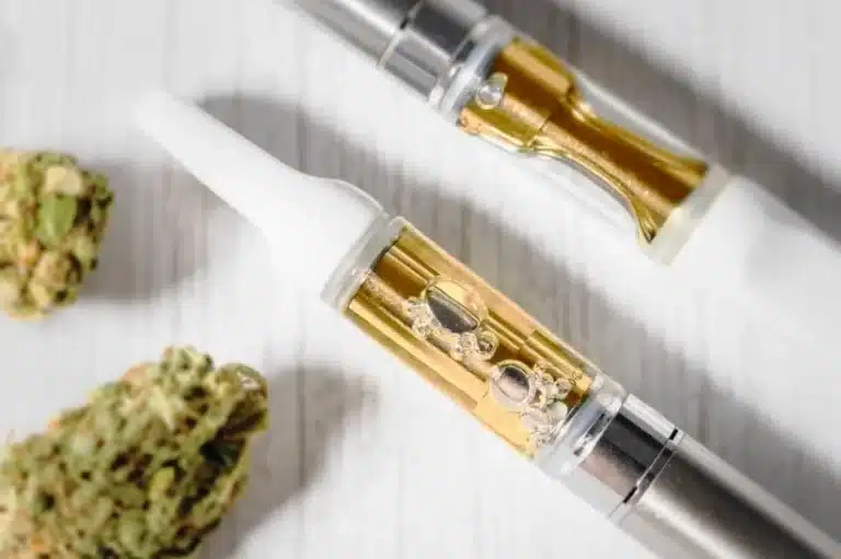 Live resin carts with nugs lying on the table
