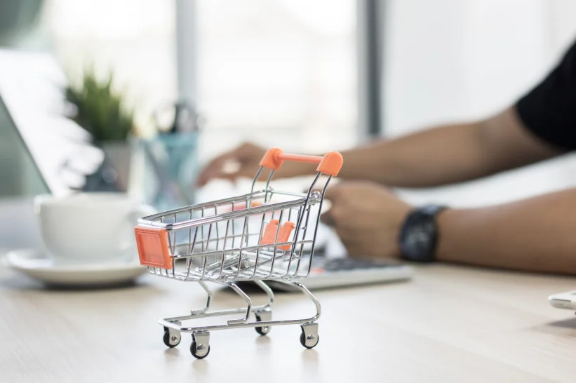 a small shopping cart on a table