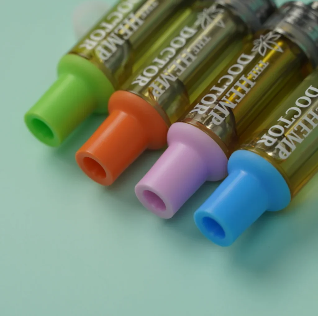 a group of different-colored cartridges.