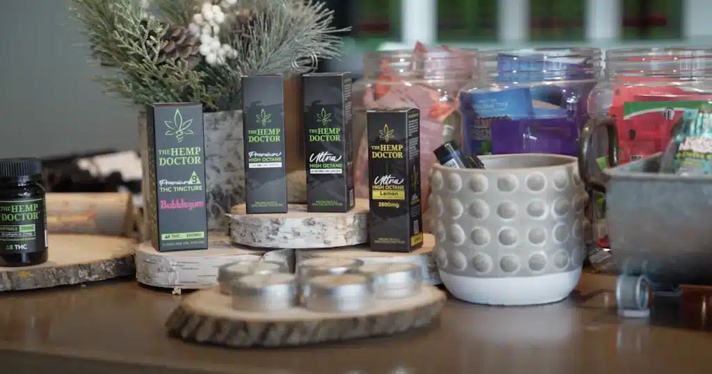 a group of boxes and containers of tinctures on a table