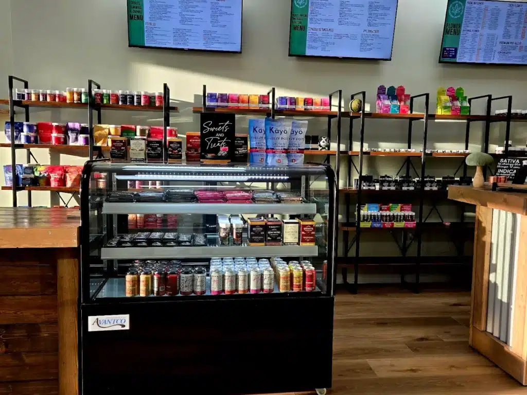 a display case with drinks on it