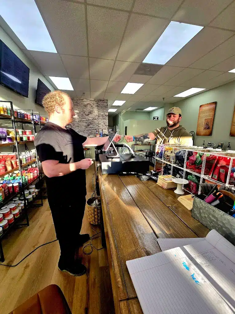 a man standing at a counter