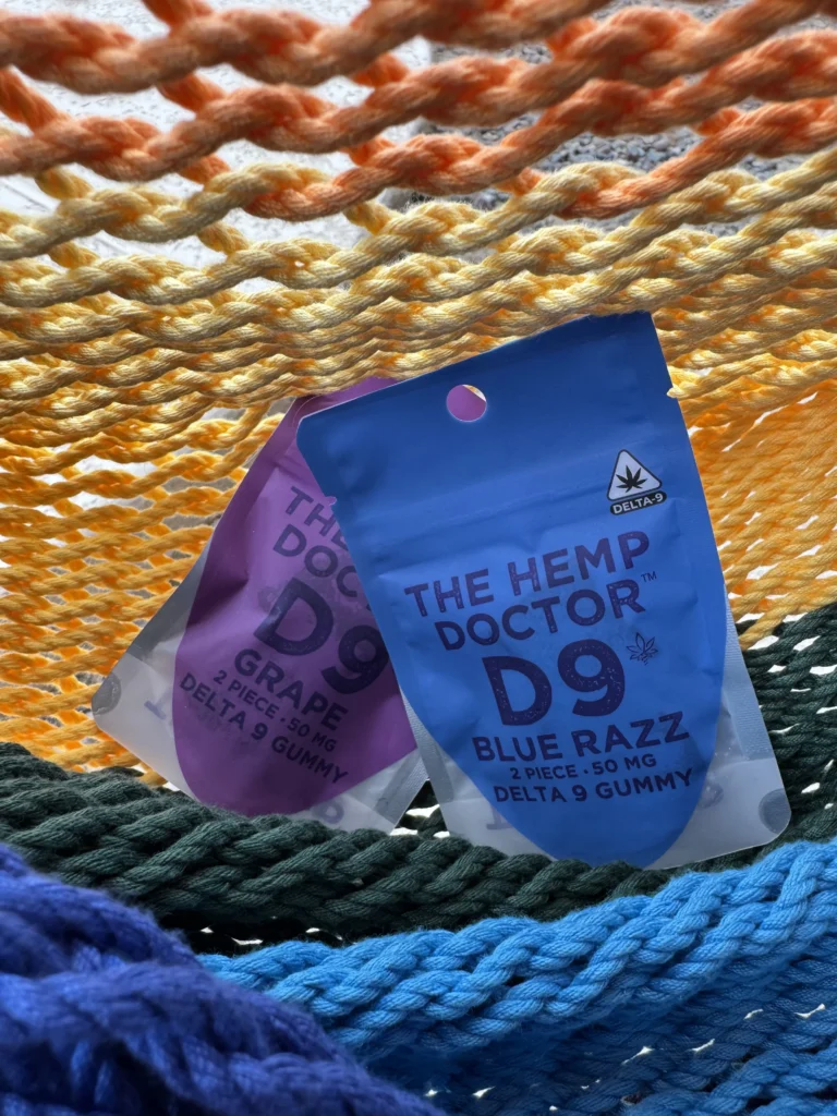 Colorful Delta 9 gummies on textured background