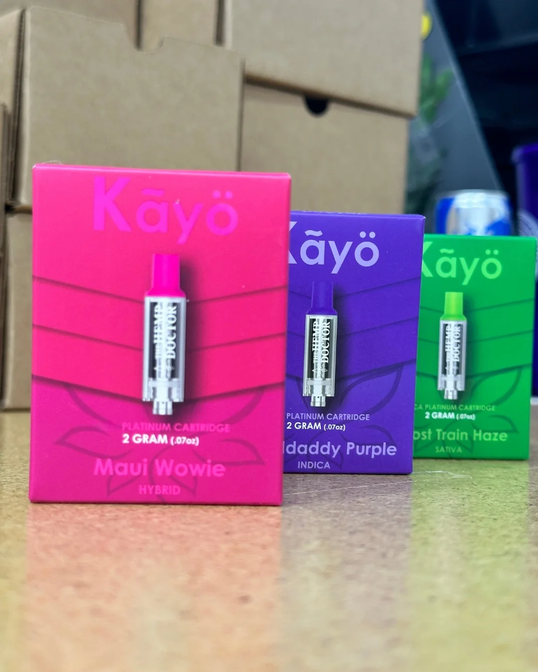 Three colorful best live rosin carts boxes