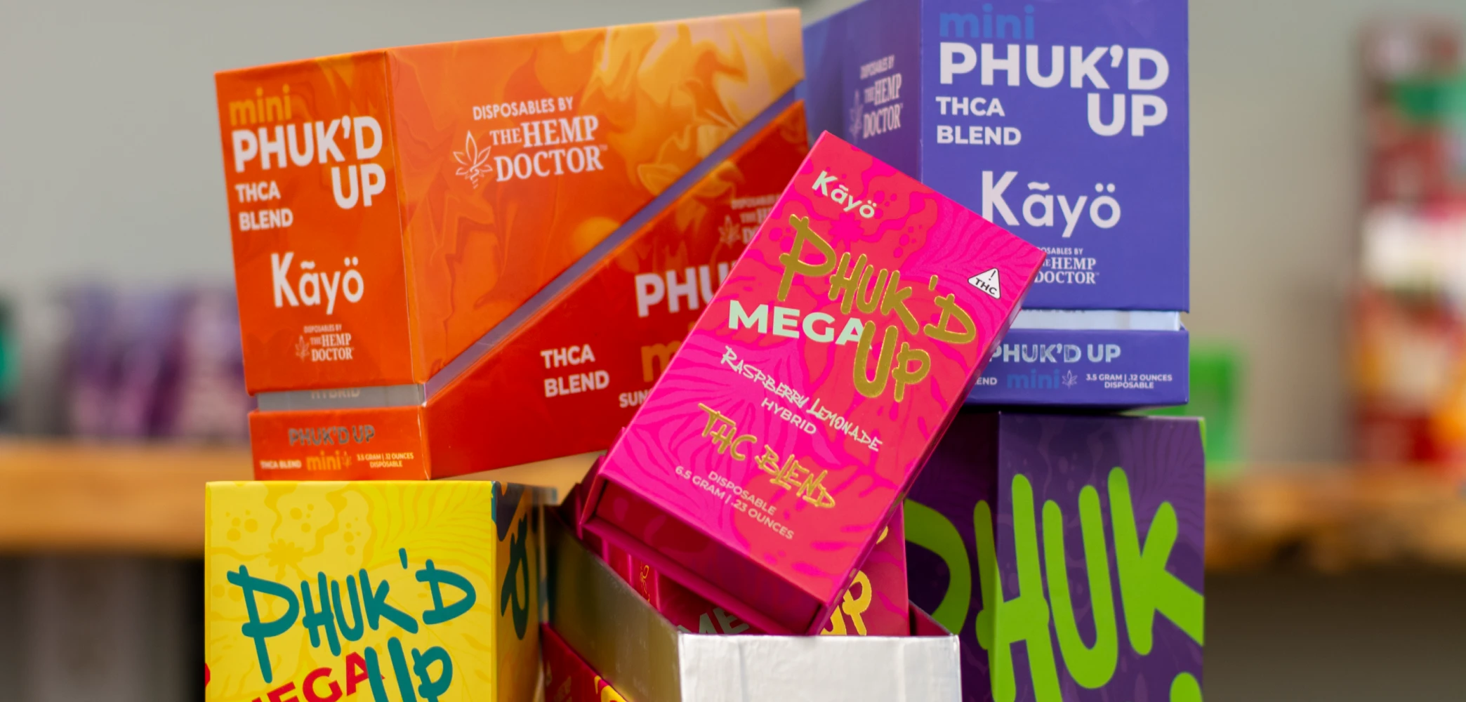 Colorful boxes of The Hemp Doctor vapes on a shelf
