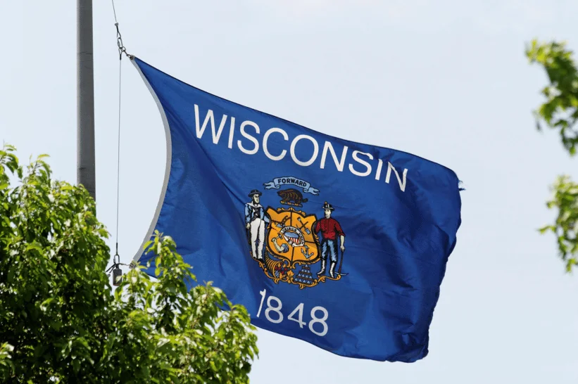 Wisconsin state flag waving outdoors
